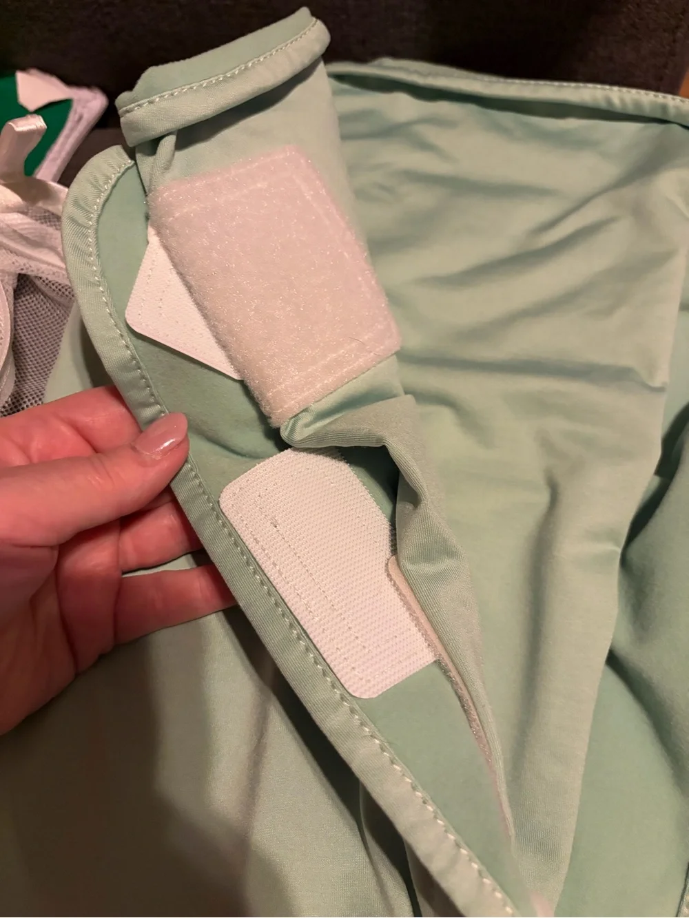 The Ollie World mint swaddle